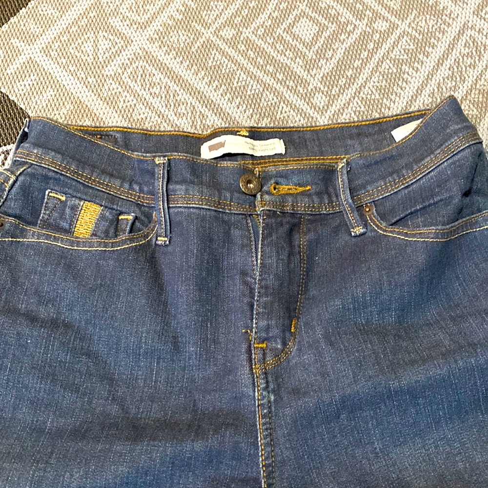 Levi’s denim jeans.  Red tab boot cut
